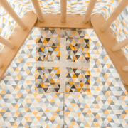 triangulo pikler con carpa amarilla